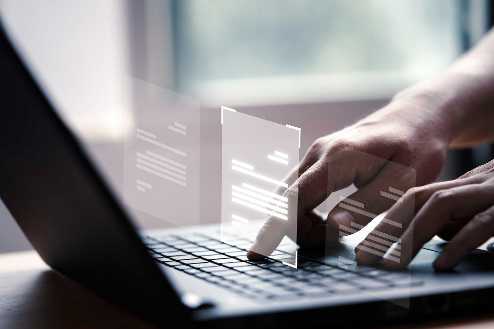 hand-using-laptop-computer_1000x667