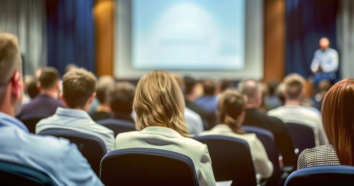 business-people-students-are-watching-presentation-attend-training-seminar-auditorium-1200x630
